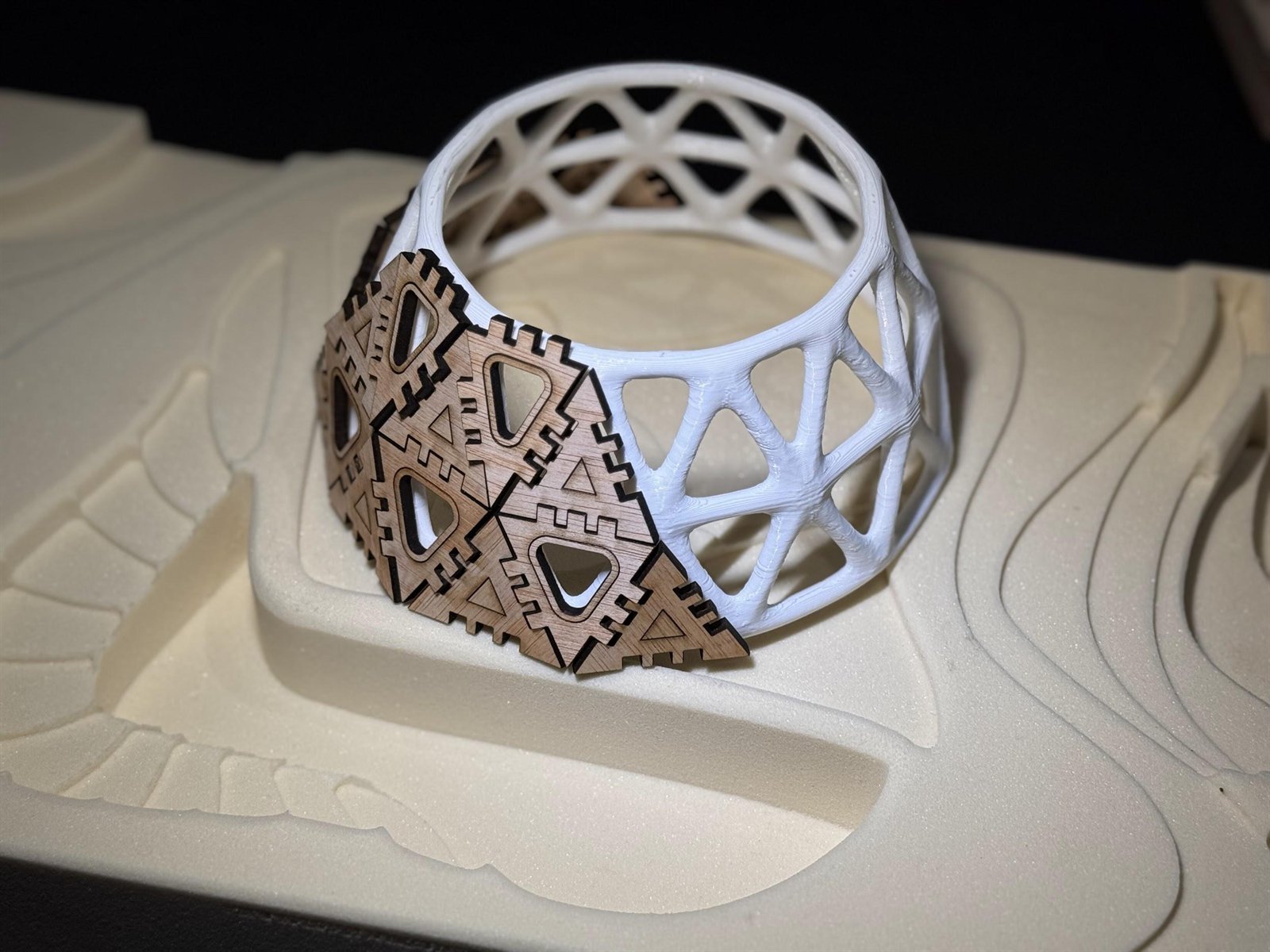 Physical prototype combining 3D printed and laser-cut components.